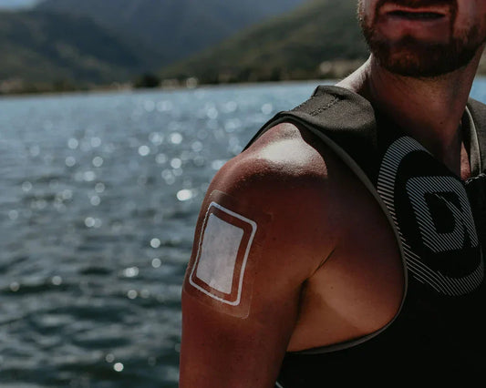 A man doing water sport and wearing a waterproof bandage