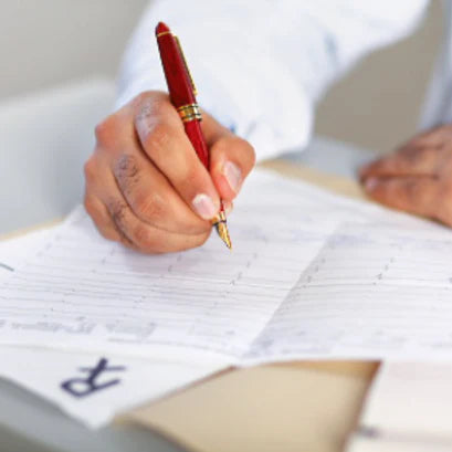 a doctor fills out medical records